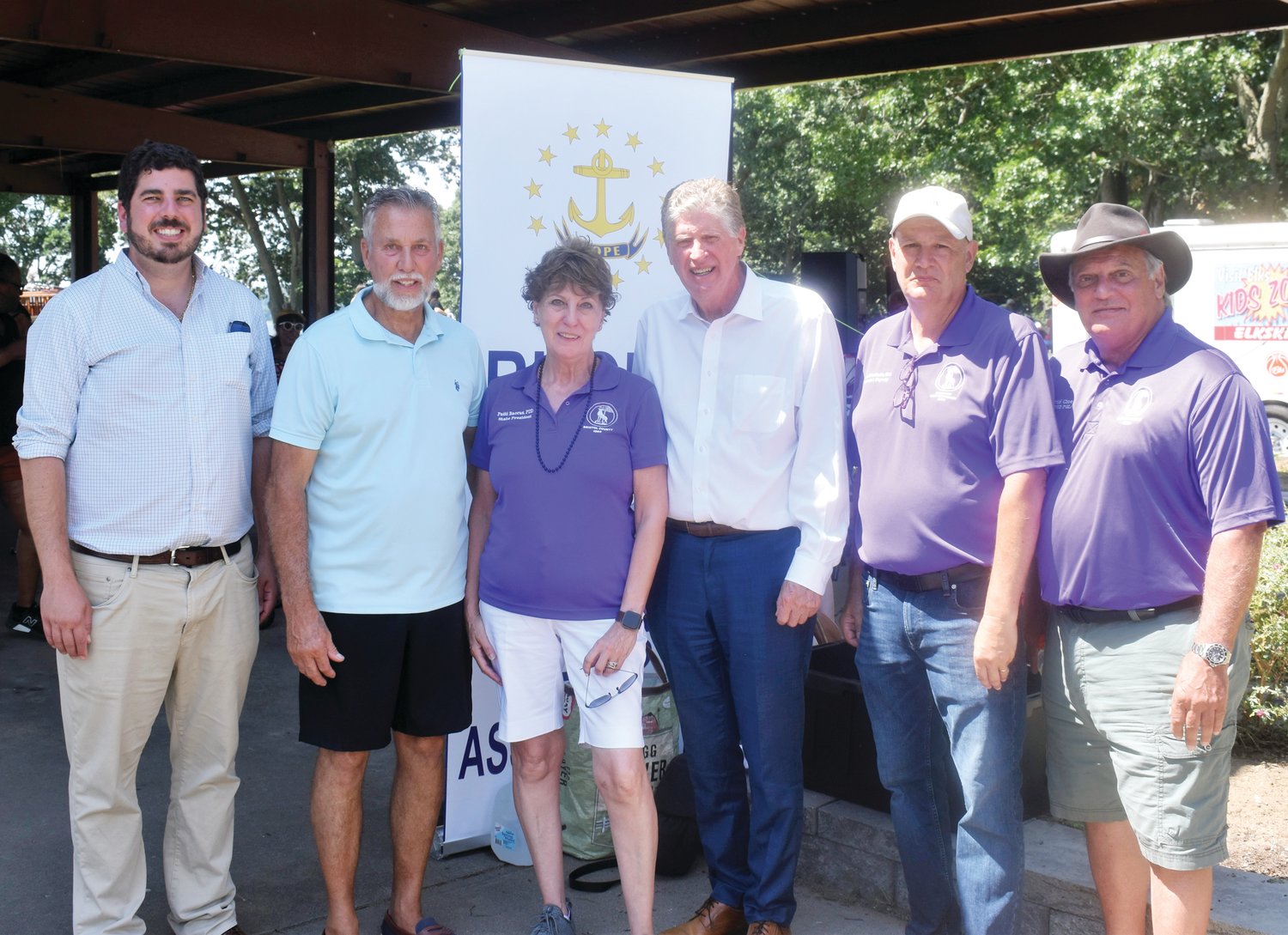 OUTSTANDING OFFICIALS: Gov. Dan McKee is joined by State rep. Joseph Solomon Jr. , State Elks Association President Patti Baccus, 365 Outing Chairman Mark Eaton, RI Grand Lodge Special Deputy Officer Leo Blanchette and Tri-City Leading Knight Rick Swanson.